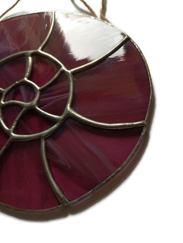 Ammonite stained glass light catcher in streaky pink glass - Image 4